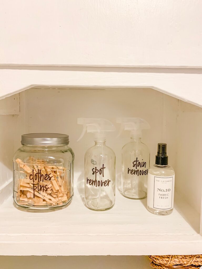 labeled glass jar and spray bottles