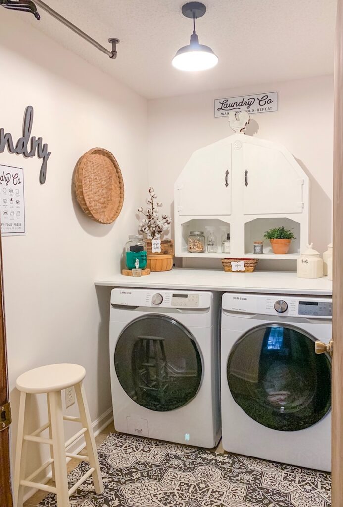 industrial curtain rod hanging from ceiling to dry clothes on