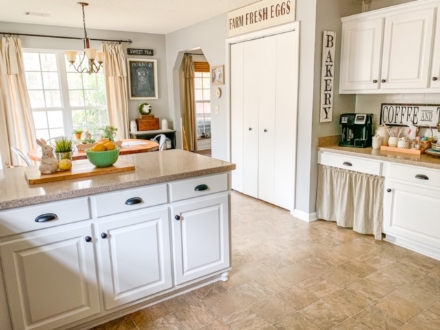 Cottage style kitchen in white, white kitchen cabinets, painting a kitchen white