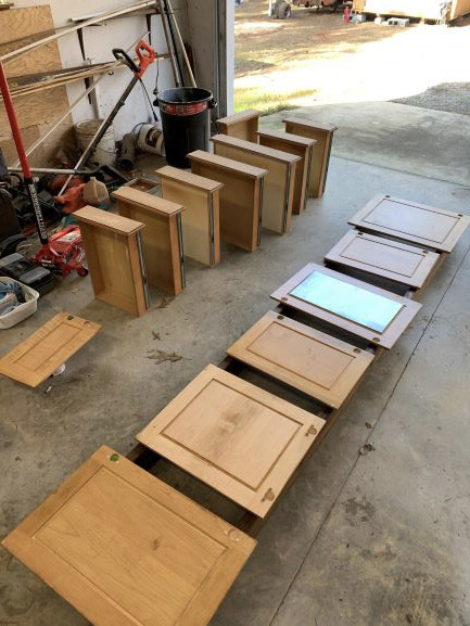 maple cabinets being sanded, sanding kitchen cabinets, sanding cabinets