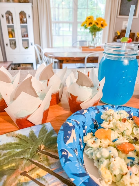 shark themed party food, shark week, party food, shark float drink, shark cupcakes, shark bait popcorn