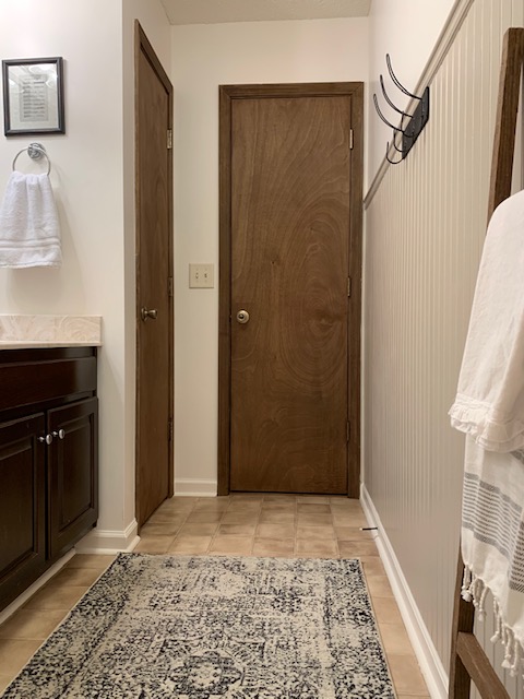 cottage style bathroom with bead board wall treatment