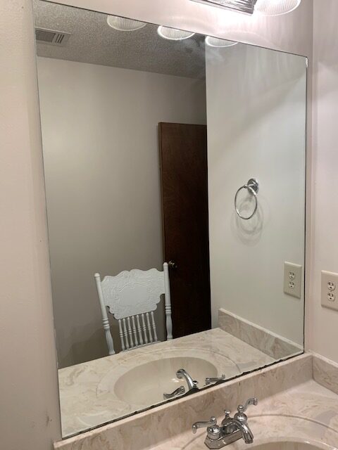 a standard bathroom wall mirror