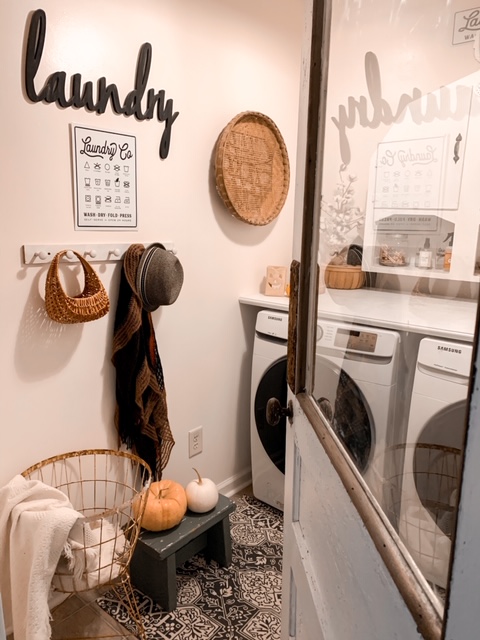 Farmhouse style laundry room decorated for fall