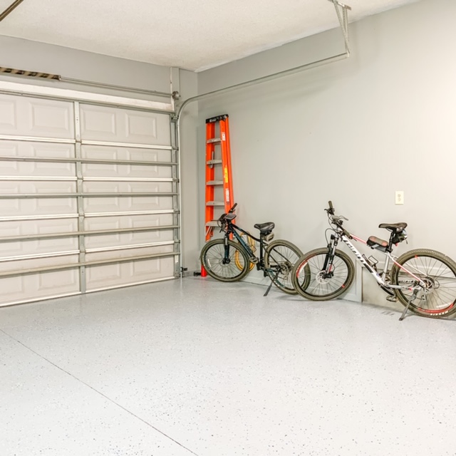 A clean and organized garage leaves room for bicycle storage