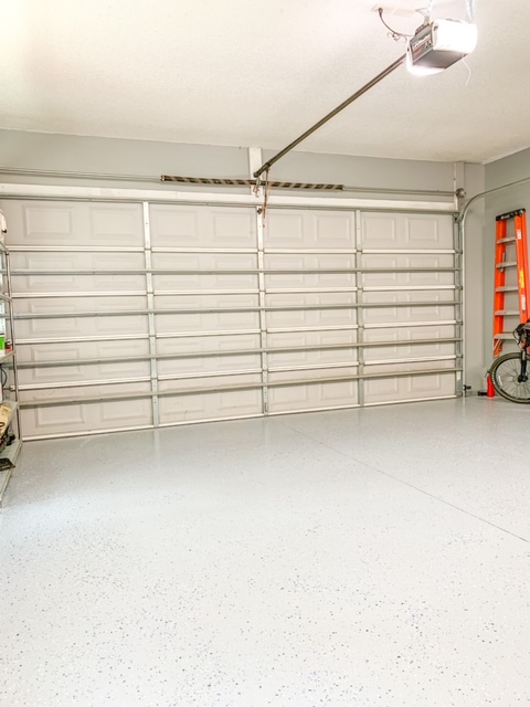 A clean garage floor made new with epoxy shield floor kit