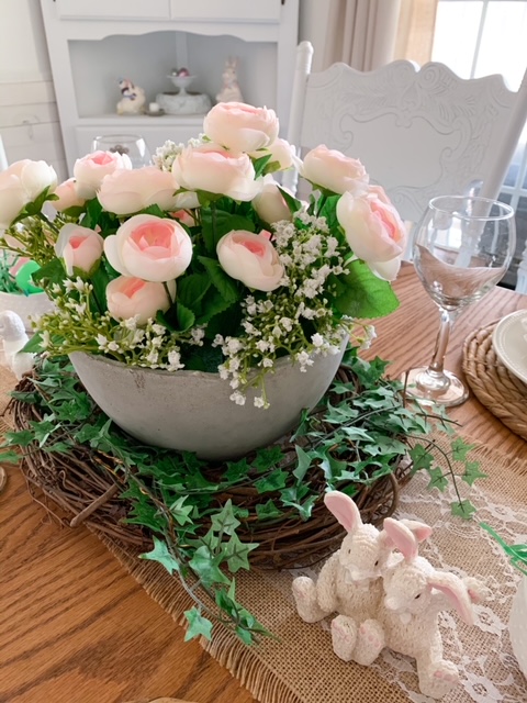 Pink faux ranunculus are a beautiful choice for an Easter table centerpiece