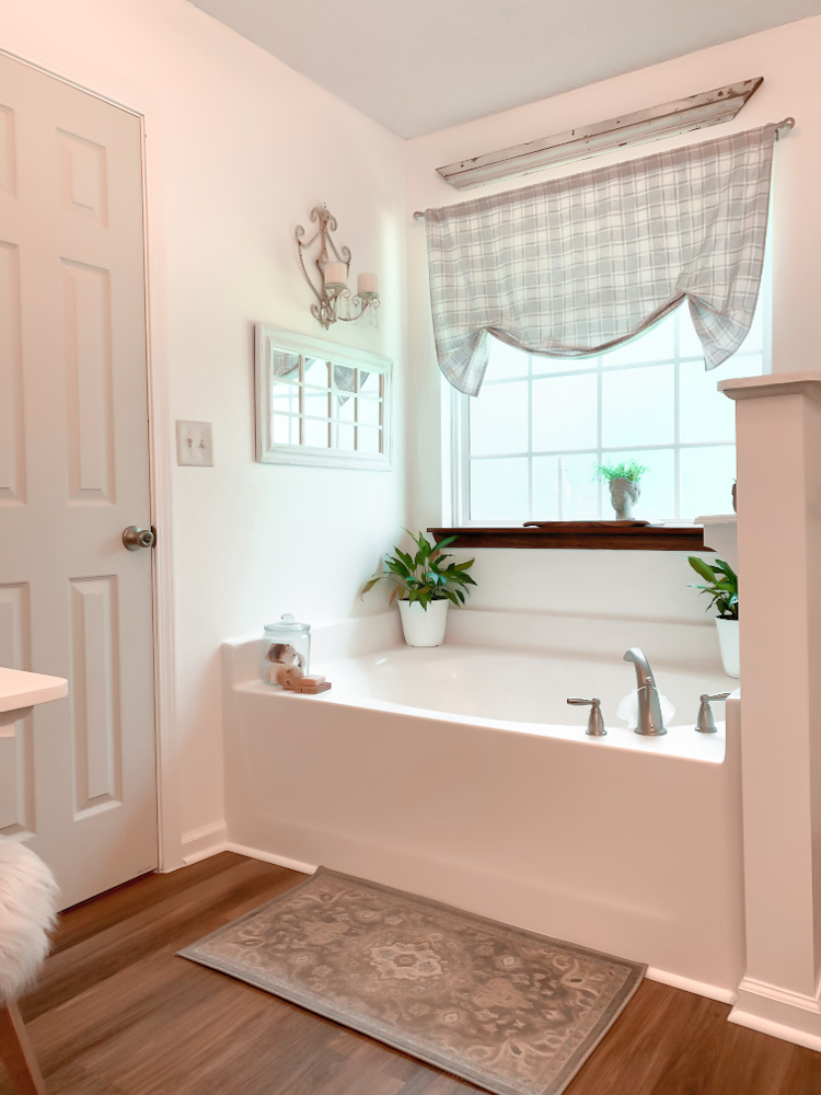 soaking tub in cottage style bathroom