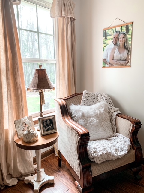 Canvas photo scroll hangs in a cottage styled bedroom