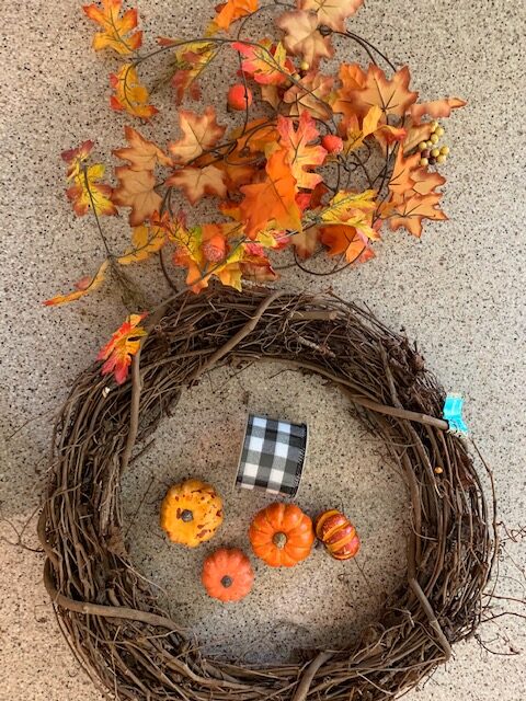 supplies to make an easy diy fall wreath for a front door