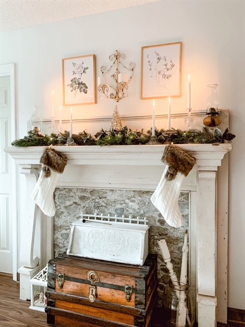 A chippy white antique mantel in master bedroom