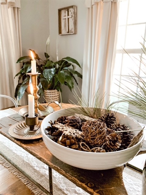 a vintage sleigh used as a centerpiece for table at Christmas