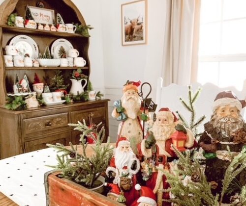 Santas in a box displayed as Christmas table centerpiece