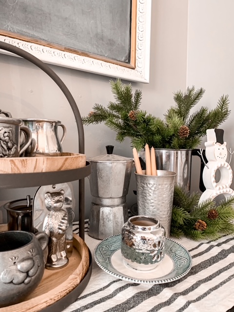 Silver and pewter accessories pair well with blue for winter decor