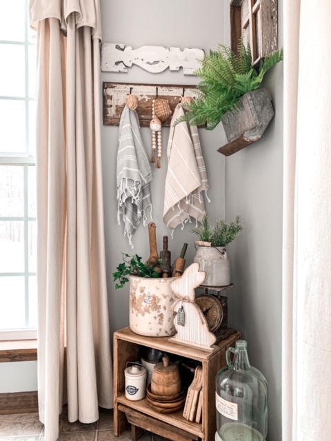 a cozy kitchen corner styled with vintage and spring finds