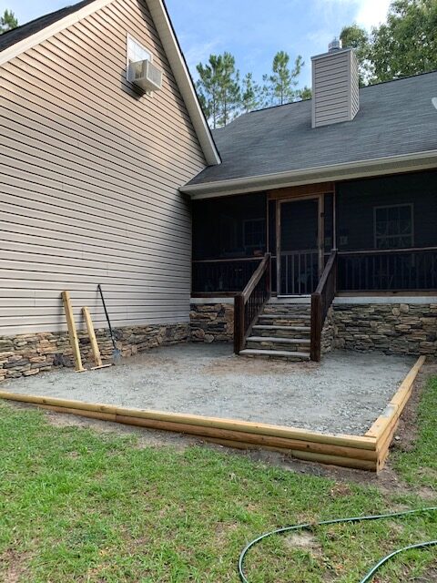 first layer of pea gravel patio completed