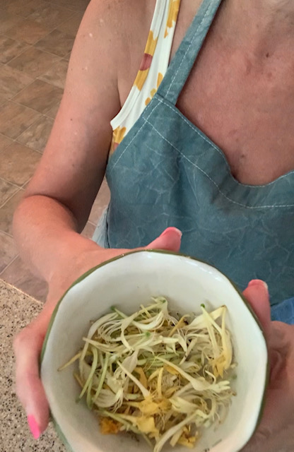 a cup of honeysuckle blooms