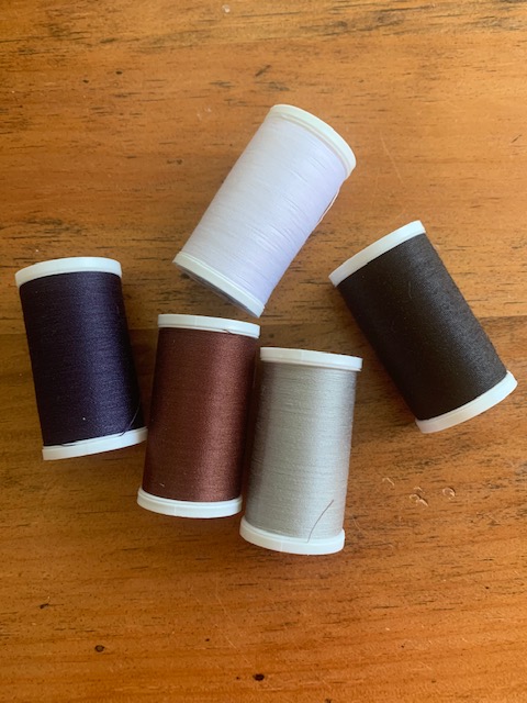 basic thread colors you need for a sewing kit
