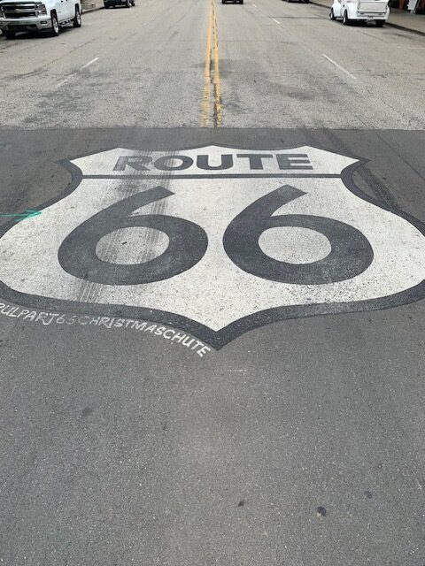 painted road sign on Route 66